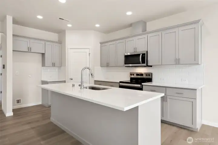 Photos are of lot 44 at Star Lake Crossing.