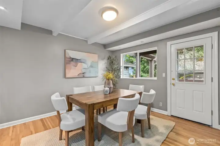 Large dining room off the backyard deck, perfect for indoor/outdoor living.