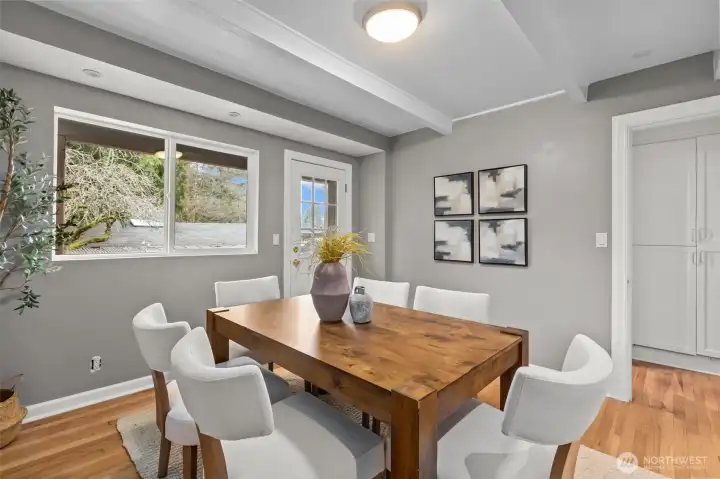 Exposed beam ceilings in the dining room.