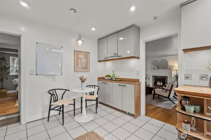 Breakfast nook and plenty of cabinetry.