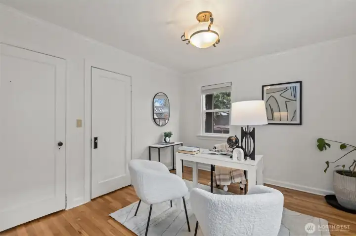 Main floor bedroom or office with french doors