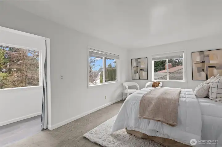 Primary suite with sunroom and private deck.