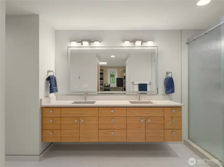 A light-up bathroom mirror enhances visibility, adds style, and creates a bright, inviting space.