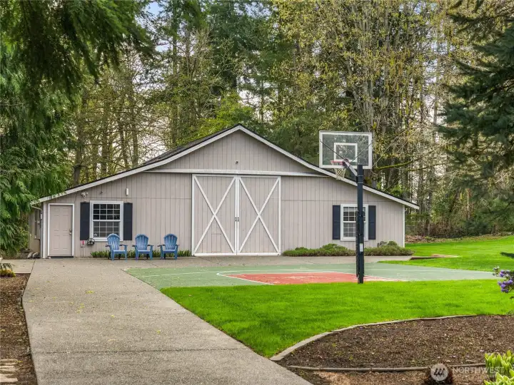 The versatile half-court basketball setup is ideal for practice and informal games. It easily accommodates a pickleball net, making it perfect for some fun pickleball matches as well. Enjoy a multifaceted space for various sports activities!
