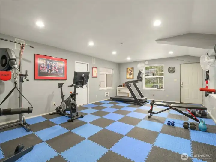 A 550 sq ft bonus room ideal for a home gym, offering ample space for equipment and workouts.