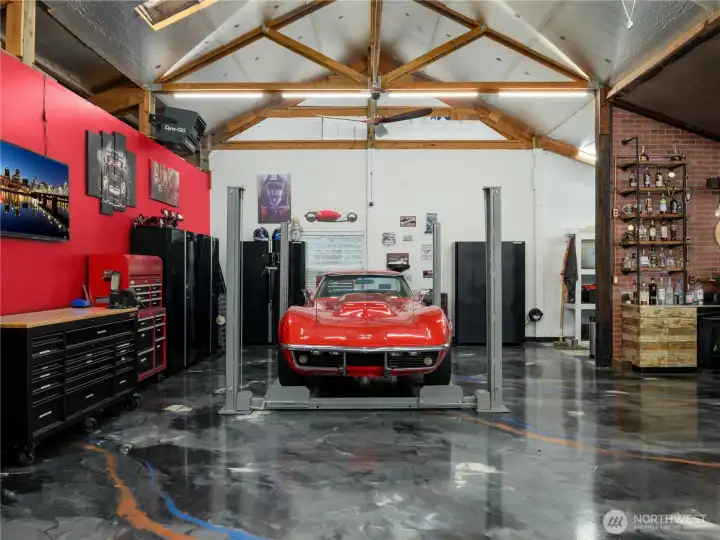 6-car capacity, 8000 lb 4-post lift available for efficient vehicle storage and maintenance.