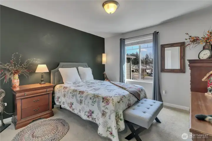 One of three additional upstairs bedrooms