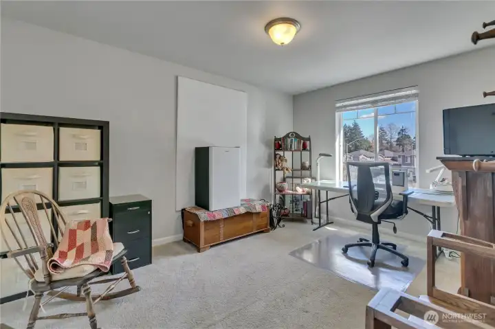 Two of three additional bedrooms upstairs