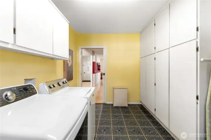 Laundry room with tons of storage, facing out towards the kitchen