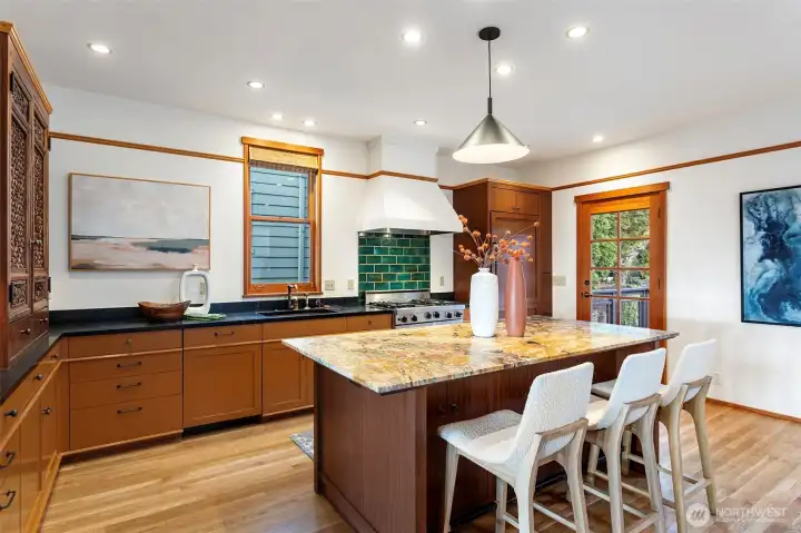 Beautifully refreshed kitchen opens to spacious private deck (upper level 2) Beautifully refreshed kitchen opens to spacious private deck (upper level 2)