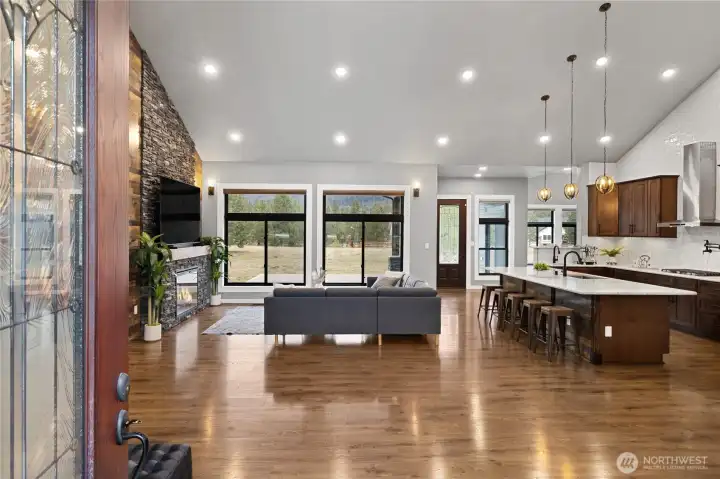 From the moment you enter, vaulted ceilings, expansive windows, and thoughtfully curated finishes create an unforgettable first impression. From the moment you enter, vaulted ceilings, expansive windows, and thoughtfully curated finishes create an unforgettable first impression.