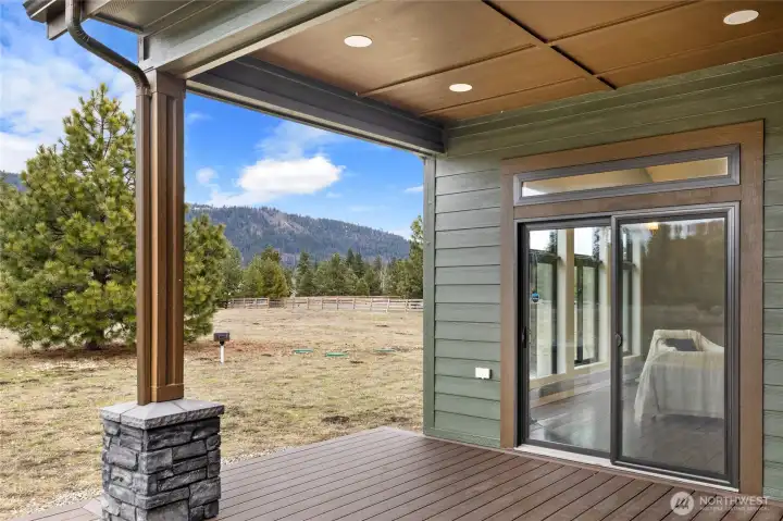 Seamless indoor-outdoor flow connects the living spaces to the private covered patio and open mountain landscape. Notice the ceiling detail - lots of bonus features in this home! Seamless indoor-outdoor flow connects the living spaces to the private covered patio and open mountain landscape. Notice the ceiling detail - lots of bonus features in this home!