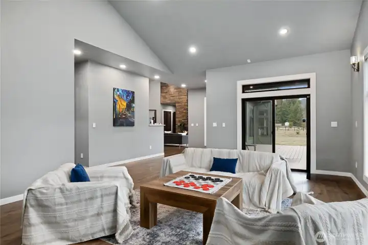 Spacious multi-use room with direct outdoor access and the potential to be reimagined as an additional primary suite, guest quarters, or private living area. Spacious multi-use room with direct outdoor access and the potential to be reimagined as an additional primary suite, guest quarters, or private living area.
