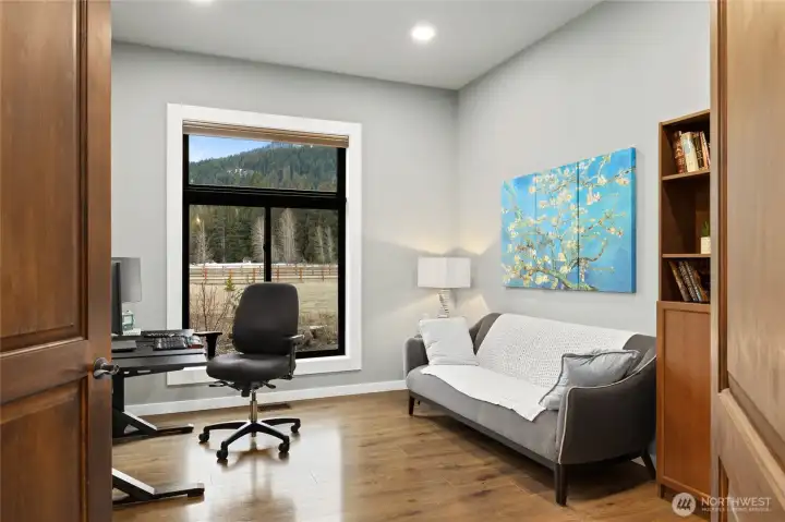 Dedicated office or flex space with oversized windows and tranquil views offers the perfect setting for working from home or quiet retreat space. Dedicated office or flex space with oversized windows and tranquil views offers the perfect setting for working from home or quiet retreat space.