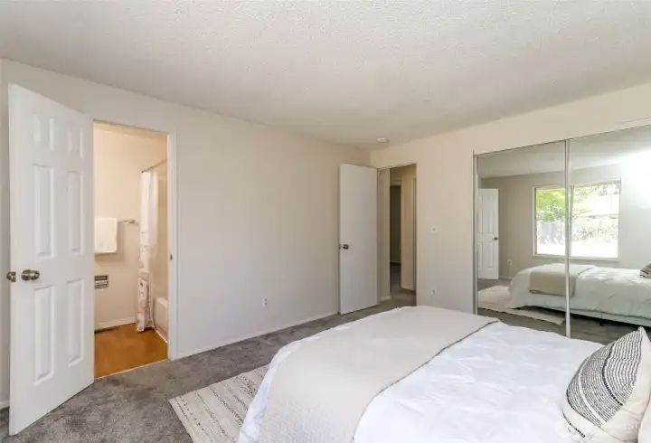 Primary Bedroom with private, full bathroom.