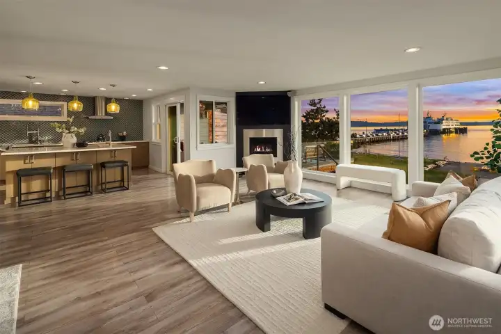 A wider view of the main living area with the kitchen in the background.