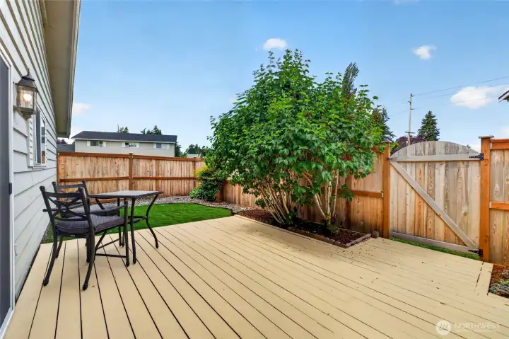 Gated deck/patio that leads out to the community's open spaces