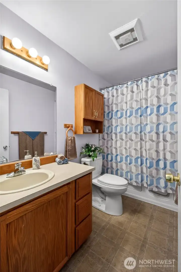 The one bath includes a walk in bath/shower