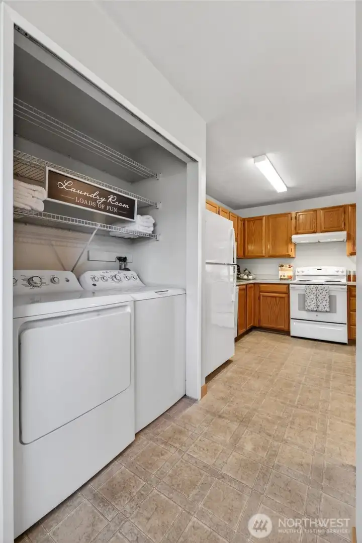 Your in-unit laudry area is just off the kitchen