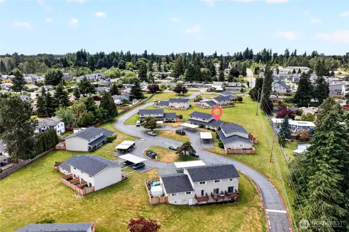 Check out all the open space around the buildings.  You will live in a condo community without that hemmed in, crowded feeling.