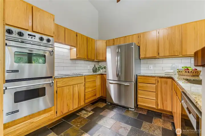Kitchen with new double oven, backsplash and countertops Kitchen with new double oven, backsplash and countertops