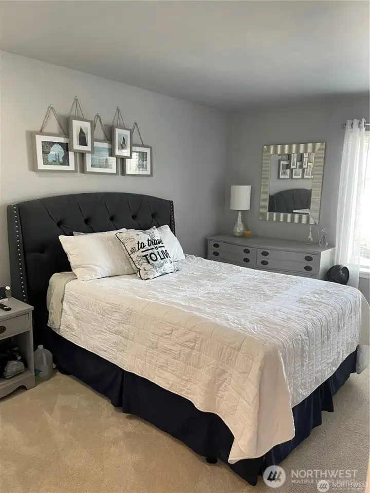 The master bedroom is spacious