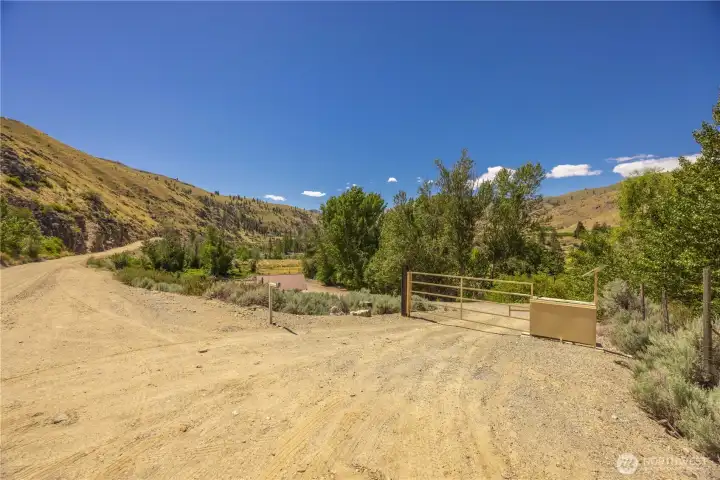 Enter the gazebo area of the property through a secure coded gate.