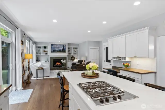 Great Room Concept for the WIN! This hub will be buzzing with action as soon as you move in as summer gatherings and play in the backyard get kick started!