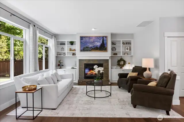 Bright Windows, Custom Bookcases, Big Gas Fireplace, Samsung The Frame TV pictured  (Not Included)