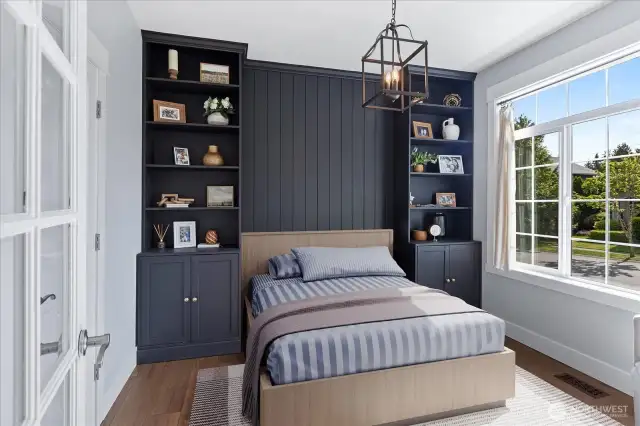Digitally Staged as a full sized bed with the cabinets functioning as an amazing wall surrounding the bed! This space has so much functionality.