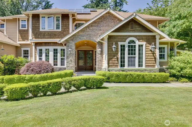 Stately Craftsman Style two story built with the finest materials accenting throughout!