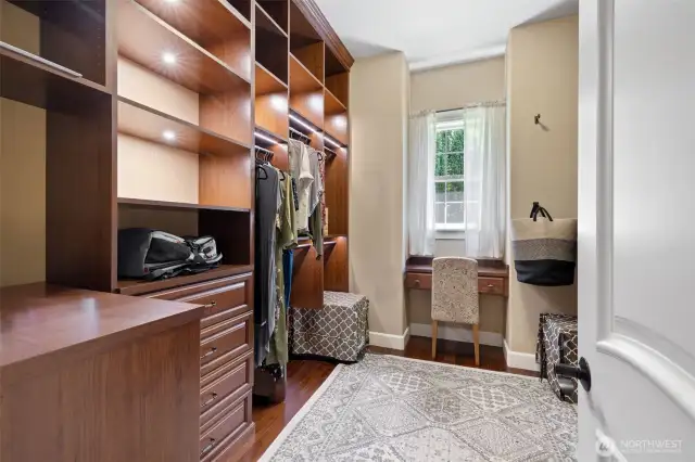 Primary bedroom closet upgraded with California Closet system!!  All that you have wanted in a closet!