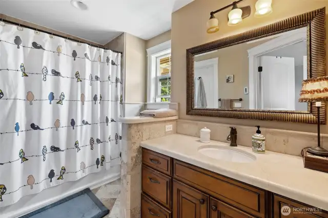 Full Jack n' Jill bathroom with wonderful materials used.