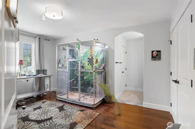 The "Bird Room"! A bedroom that the current owner has some exotic birds in.  Has a separate wash sink and cabinetry, and access to the Jack n' Jill bathroom.