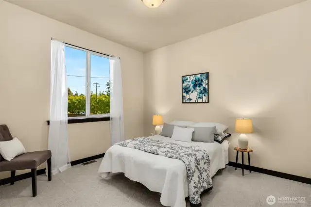Main floor bedroom for guests or home office.