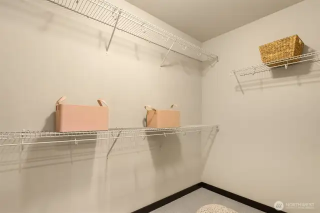 Primary suite walk-in closet.