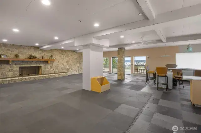 Lower basement with access to deck.