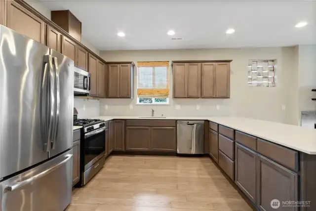 Large Kitchen with Quartz Counters and Stainless Steel Appliances