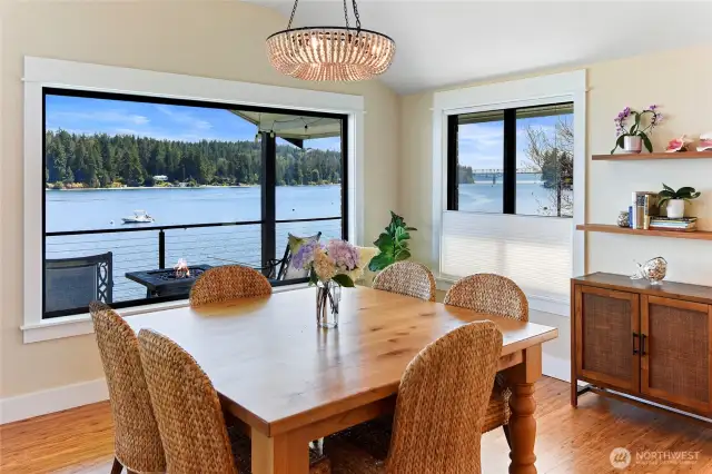 Dining room, killer view, honeycomb dual rise and drop shades.