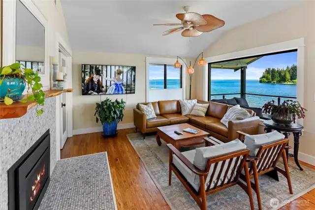 Living room propane fireplace, double door to primary bedroom, ceiling fan...