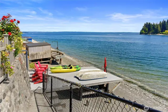 Down the ramp is the waterside dock with bulkhead, davit, and rollers for easy kayak loading and unloading.  Here's where you can get a good look at the stone and concrete bulkhead.  Notice the open gate at the bottom of the ramp.