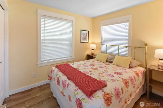 And the bedroom has room to spare.  Blinds for privacy, and built-ins in the closet.