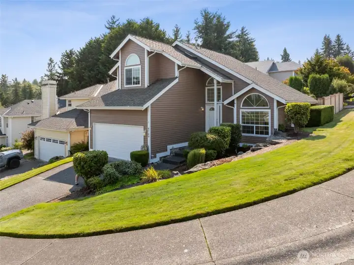 Home sits on a corner lot.