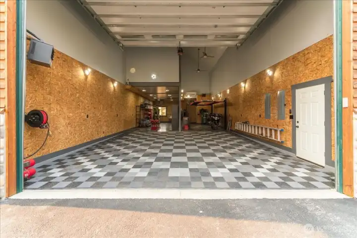 Impressive detached shop with car lift