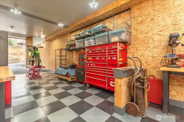 Race deck flooring and amble storage in shop