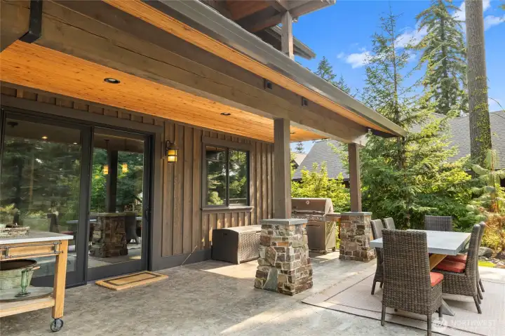 Covered BBQ space and outdoor dining space