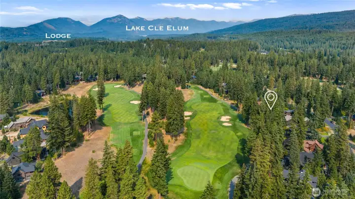 Aerial view of neighborhood and golf course