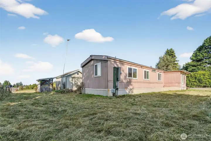South east side of the Manufactured home, where the electrical meter is located.