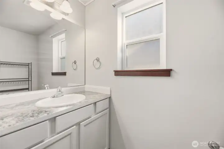Bathroom next to Laundry Room