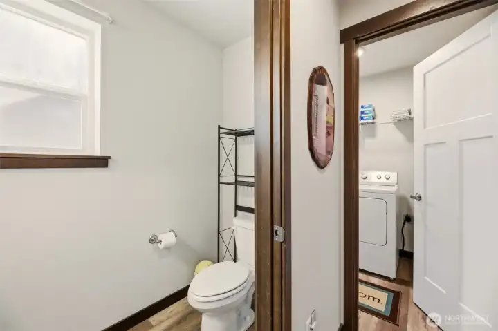 View of lower Bathroom & peak at Laundry Room